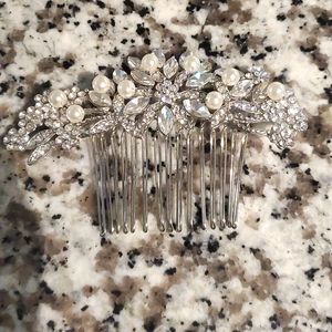 Hair Comb, used once for our wedding and reception. Open to negotiating